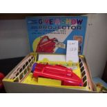 A Chad valley Give-A-Show projector in box complete with slides