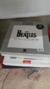 6 Beatles CD boxed sets.