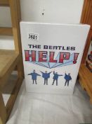 A Beatles Help deluxe DVD set.