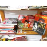 A shelf of Elvis books.