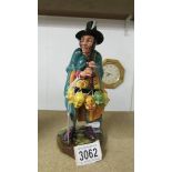 A Royal Doulton figure 'The Mask Seller', HN2013.