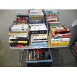 A large quantity of books and vhs videos on war