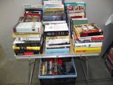 A large quantity of books and vhs videos on war