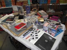 A large quantity of JFK, Kennedy related books, videos, slides etc.