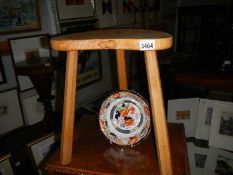 A good oak 3 legged stool with carved mouse (possibly Mouseman).