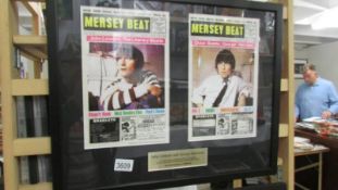 A framed and glazed John & George covers of Mersey Beat magazine.