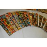 A quantity of Justice League America comics