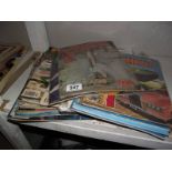 A quantity of Thunderbirds magazines.