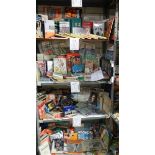 4 shelves of football related memorabilia including programmes, hard back books, paperback books,