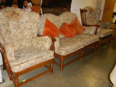 An Ercol three piece suite.