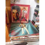 A quantity of Elvis LP records.