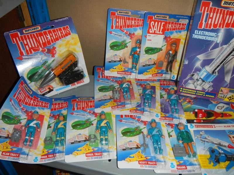 A large shelf of assorted Thunderbird toys,. - Image 3 of 3