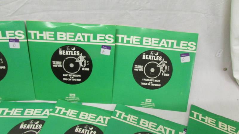 22 Beatles 45 rpm records. - Image 2 of 4