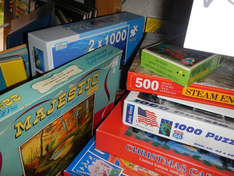 Twelve jigsaw puzzles (one shelf). - Image 2 of 3