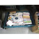 A large quantity of unsorted 45 rpm records.
