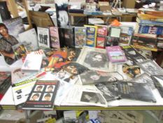 A massive collection of Beatles tapes, books, videos including Ed Sullivan shows.