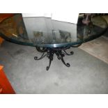 A super quality metal based designer table with glass top.