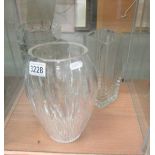 3 large glass vases.