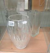 3 large glass vases.