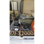 A boxed Alinco DJ-X 2000 multi band receiver with mains lead and fast charger, in working order.