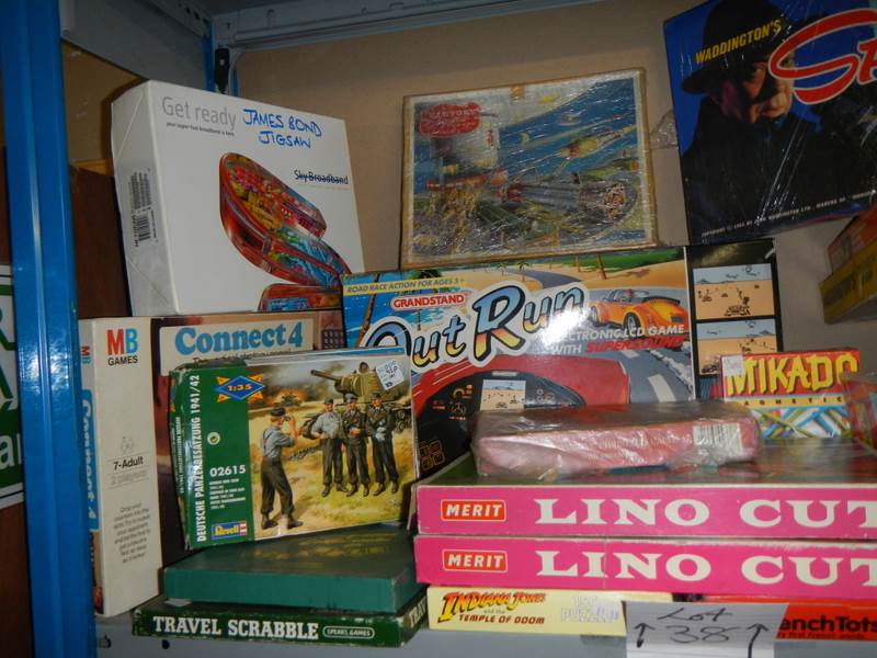 A large shelf of puzzles and games. - Image 2 of 3