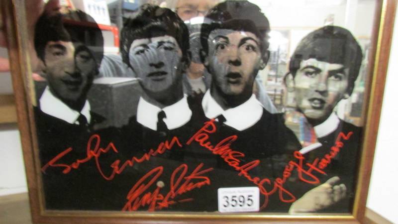 A small Beatles mirror.