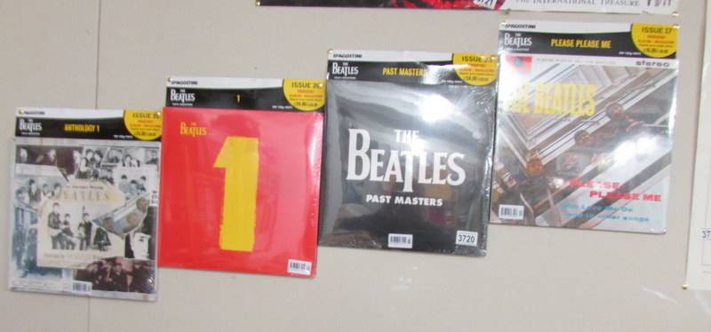 4 D'Agostoni Beatles LP records.