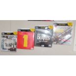 4 D'Agostoni Beatles LP records.