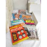A quantity of early Beatles magazines.