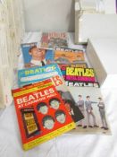 A quantity of early Beatles magazines.