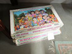 7 The Beatles Ilustrated lyrics puzzle in a puzzle, puzzes complete and with answers but no posters.