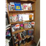 A bookcase of Beatles books.