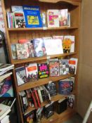 A bookcase of Beatles books.