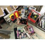 A good lot of Beatles books, DVD signed,
