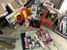 A good lot of Beatles books, DVD signed,