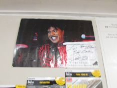 A signed Little Richard poster.