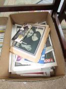 A box of Newspapers featuring the Beatles.