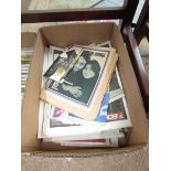 A box of Newspapers featuring the Beatles.