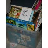 A box of assorted books including wildlife.