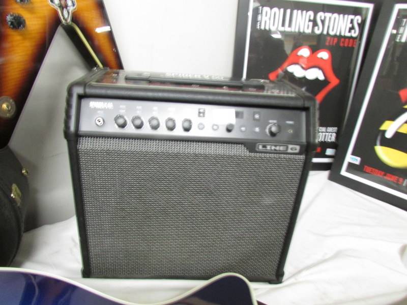 A Spider V60 guitar amplifier with build in effects, in good condition.