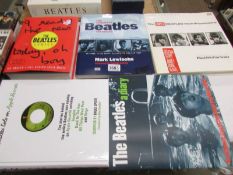 5 Beatles coffee table books.