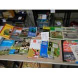 A mixed lot of football books, videos, programmes etc.