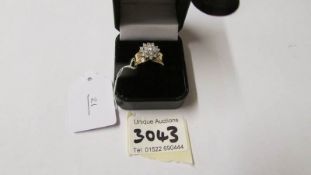 A 14ct yellow gold impressive diamond cluster ring, 2cts approx. size O.