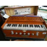 An Anand Singh & Co., 2 fold bellow harmonium.