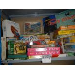 A large shelf of puzzles and games.