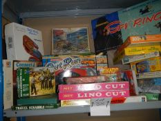 A large shelf of puzzles and games.
