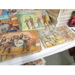 Six 1960's Beatles jigsaw puzzles illustrated by the renowned artist Walt Howarth.