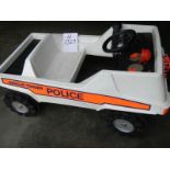 A police pedal car.