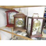 3 mantel clocks.