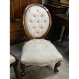 A Victorian walnut cabriole leg chair.